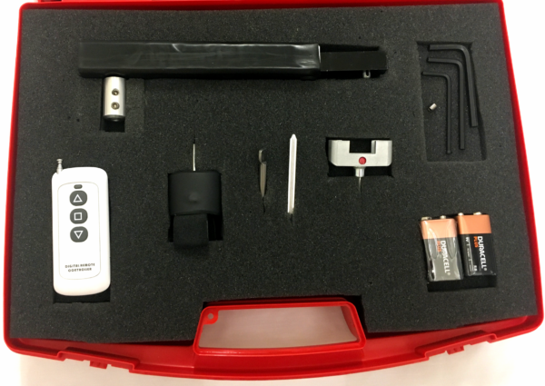 Various components in a red case with black foam lining